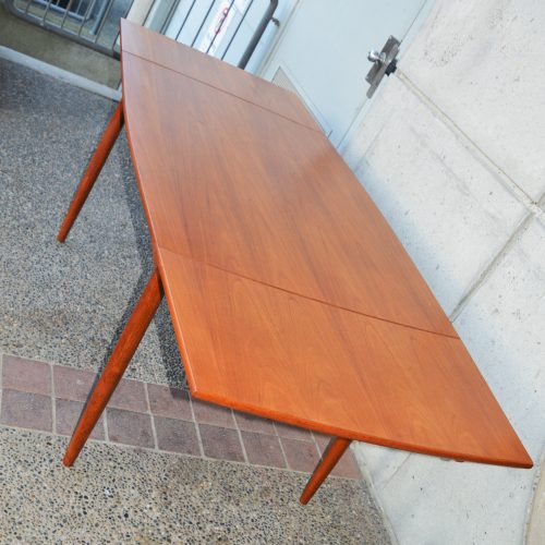 Spectacular teak surfboard draw leaf dining table