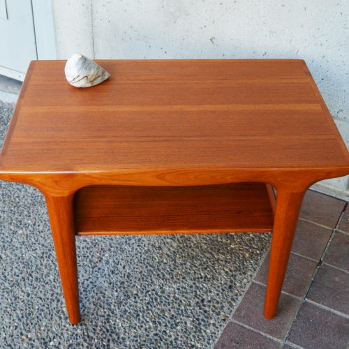 Teak side table by Johannes Andersen w/ sultry curves & shelf