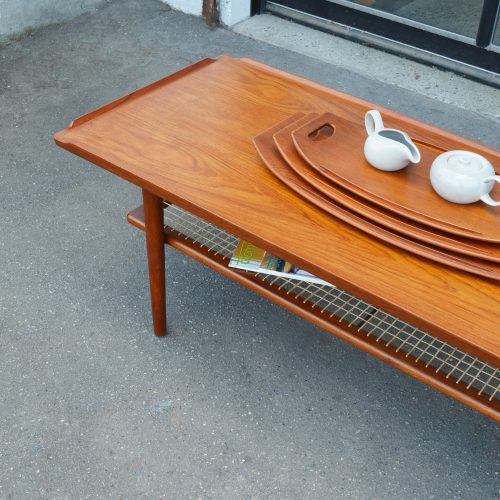 Sleek Teak Coffee Table w/ Flared Top Edges & Cane Shelf